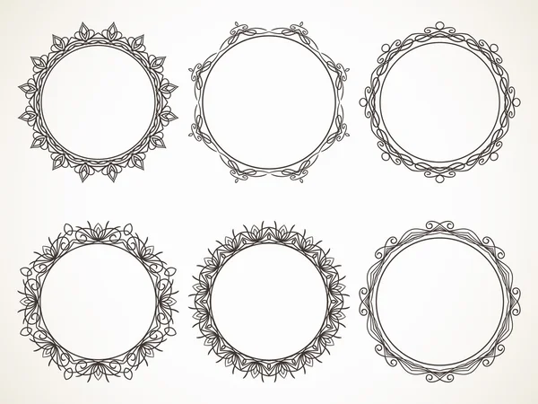 Molduras redondas caligráficas — Vetor de Stock