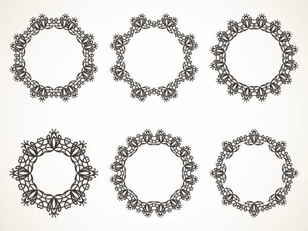 Calligraphic round frames — Stock Vector