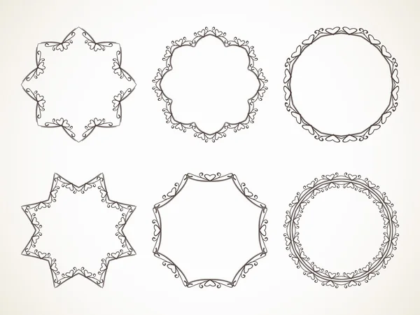 Molduras definidas com elementos de design de corações — Vetor de Stock