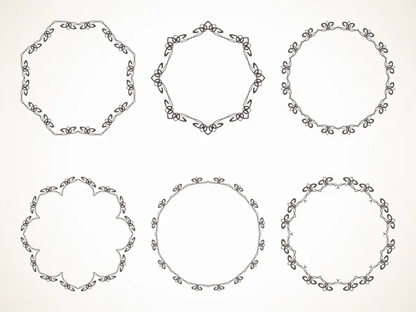 Calligraphic round frames — Stock Vector