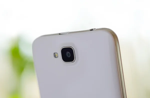 Zblízka obraz kamery bílý mobilní telefon — Stock fotografie