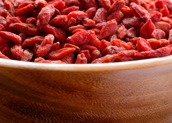 Wooden Bowl Full of Dried Goji Berries — Stock Photo, Image