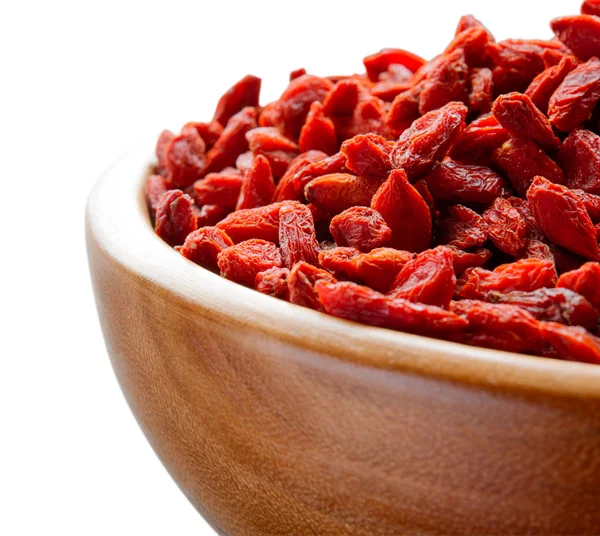 Wooden Bowl Full of Dried Goji Berries on the White Table — Stock Photo, Image