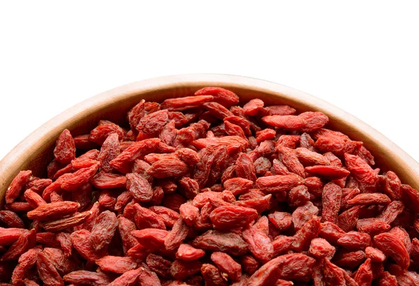 Wooden Bowl Full of Dried Goji Berries on the White Table — Stock Photo, Image