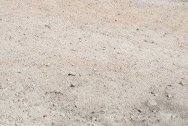 Çakıl taşları arka plan dokusu ile kayalık kuru toprak
