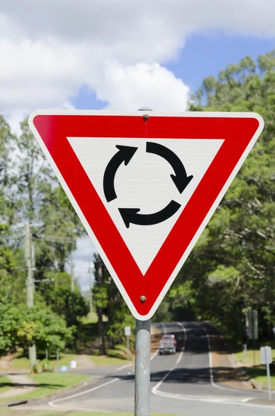 Give way roundabout traffic sign — Stock Photo, Image