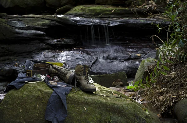 Hiking gear at creek