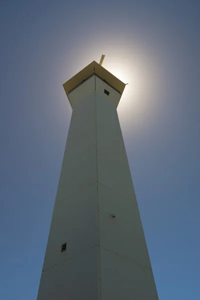 Fyren framför solen — Stockfoto