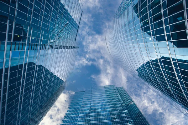 Futuristic modern skyscrapers of glass and metal. — Stock Photo, Image