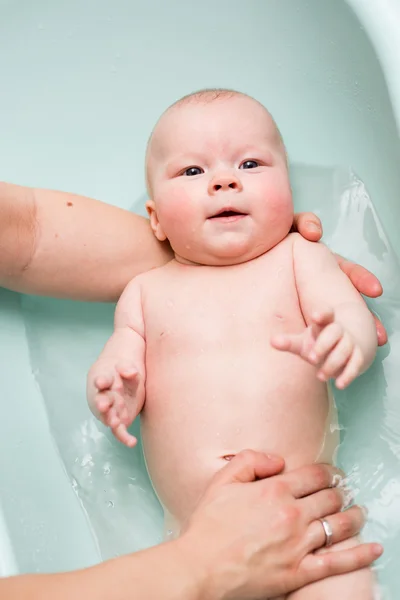 Baby girl taking a bath Royalty Free Stock Photos