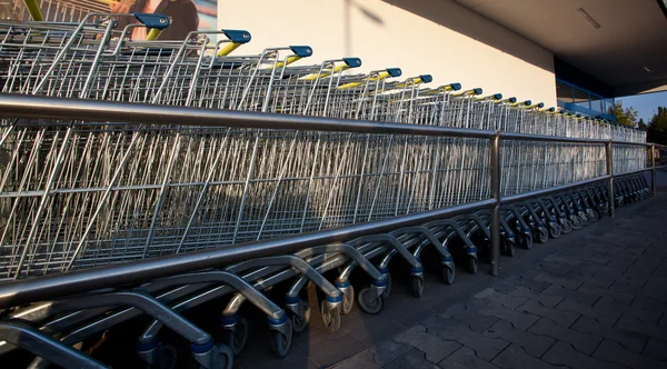 Supermarket shopping cart trolleys — Stock Photo, Image