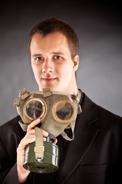 Businessman with gas mask — Stock Photo, Image