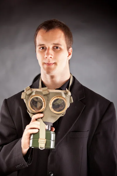 Businessman with gas mask — Stock Photo, Image