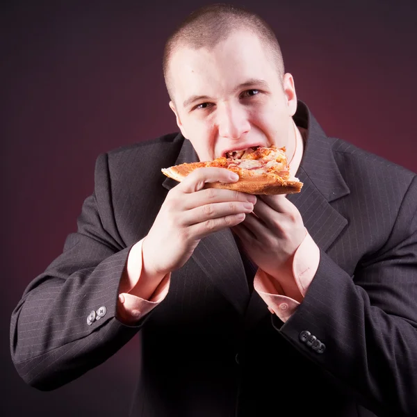 Hungry businessman — Stock Photo, Image
