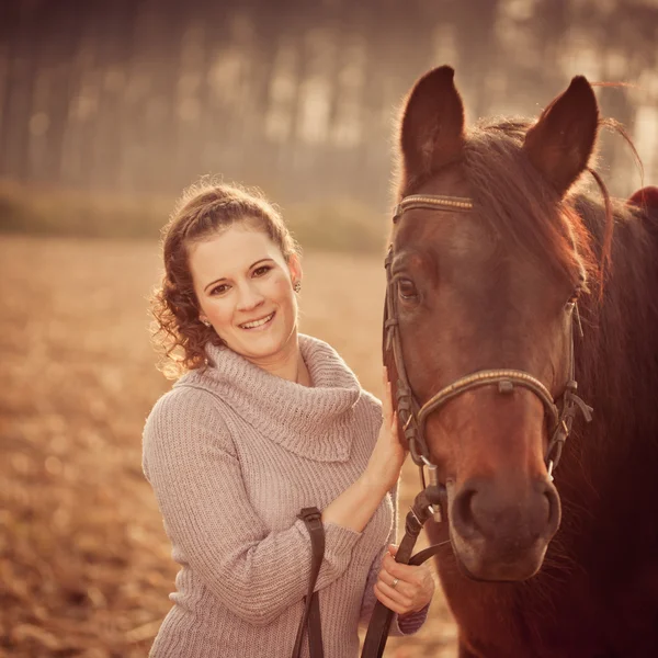 Beautiful woman with horse — Stock Photo, Image
