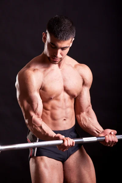 Young bodybuilder traininig — Stock Photo, Image