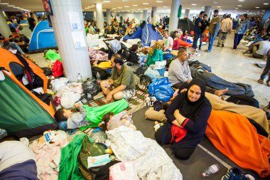 War refugees at the Keleti Railway Station clipart