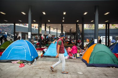 War refugees at the Keleti Railway Station clipart