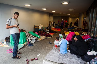 War refugees at the Keleti Railway Station clipart