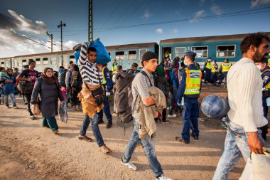 War refugees at the Gyekenyes Railway Station clipart