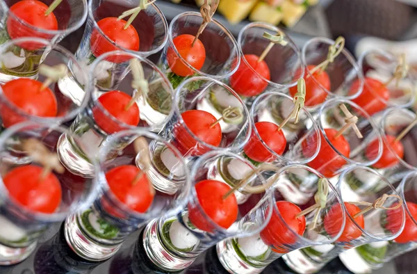 Cheese canapes with cherry tomatoes in the glass — Stock Photo, Image