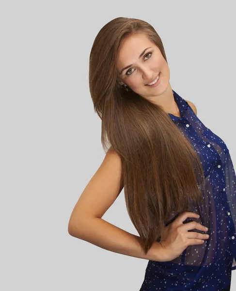 Beauty model woman with long brown wavy hair — Stock Photo, Image