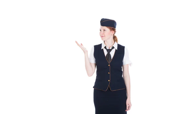 Lachende stewardess in uniform geïsoleerd op een witte achtergrond — Stockfoto