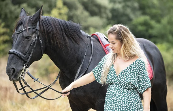 Riding Girl Walking Her Black Horse — Stock Photo, Image