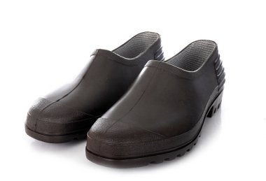 Beyaz arkaplan önünde bahçe için ayakkabılar