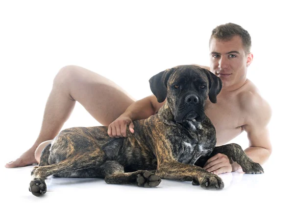 Naked man and italian mastiff — Stock Photo, Image