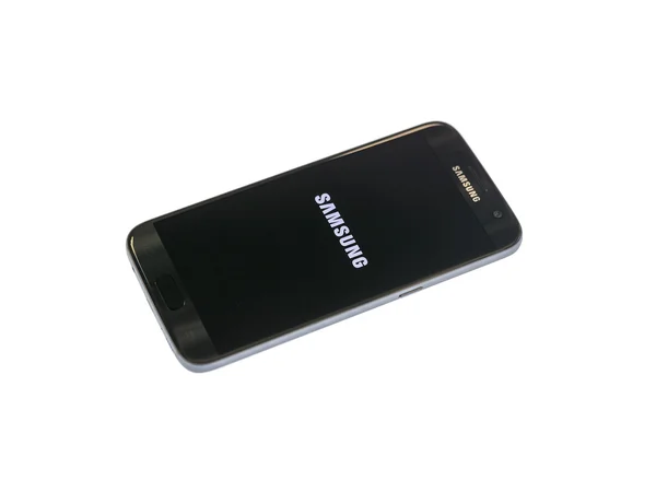 Фото Samsung Galaxy S7 проти білого. Samsung S7 є нового покоління смартфонів від Samsung — стокове фото