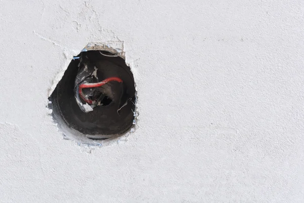 Exposed wires in electrical outlet — Stock Photo, Image