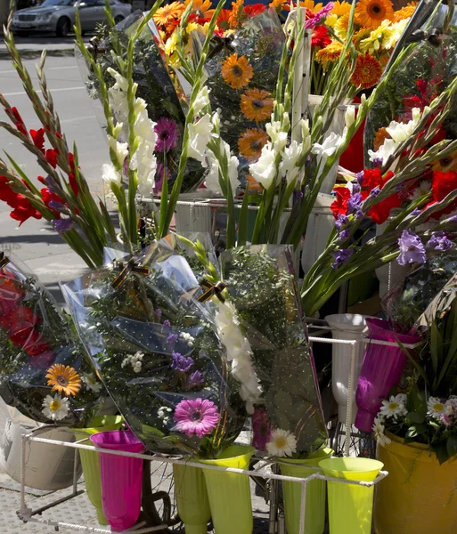 Various bouquets of flowers on a street — Stock Photo, Image