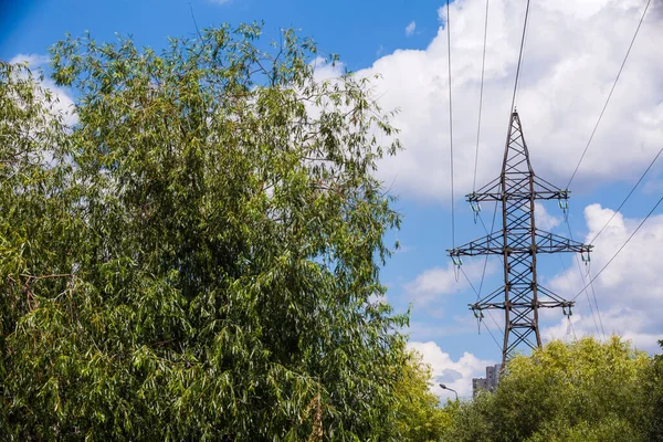 Electricity is the major energy of the world. High voltage post. High voltage tower sky background. Aerial industrial background group of transmission towers.