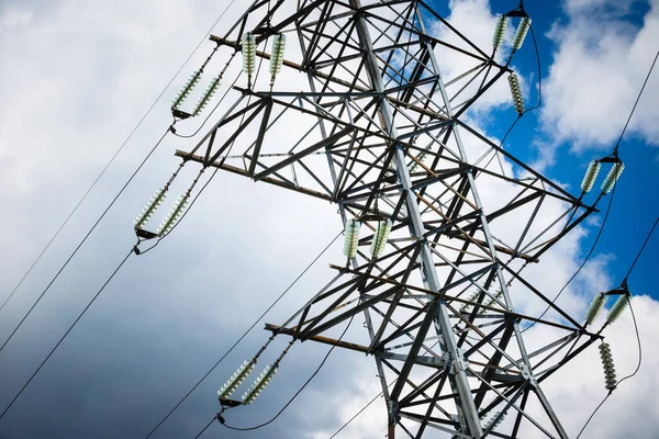 Electricity is the major energy of the world. High voltage post. High voltage tower sky background. Aerial industrial background group of transmission towers.