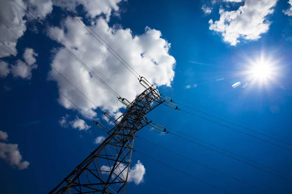 Electricity is the major energy of the world. High voltage post. High voltage tower sky background. Aerial industrial background group of transmission towers.