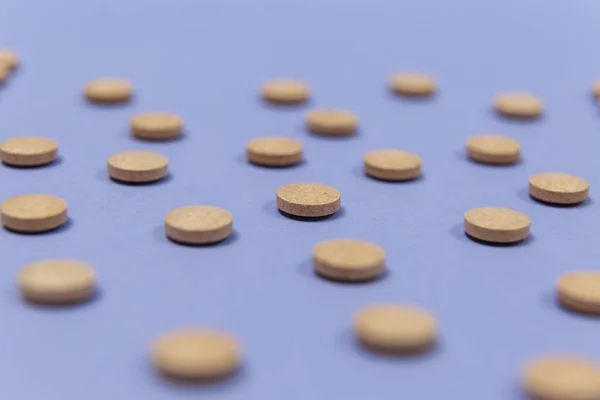 Many Brown Pills Purple Background Copy Space — Stock Photo, Image