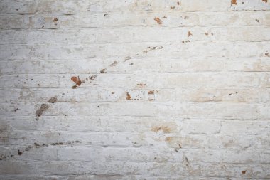 Kırmızılı beyaz tuğlalı eski tuğla duvar.