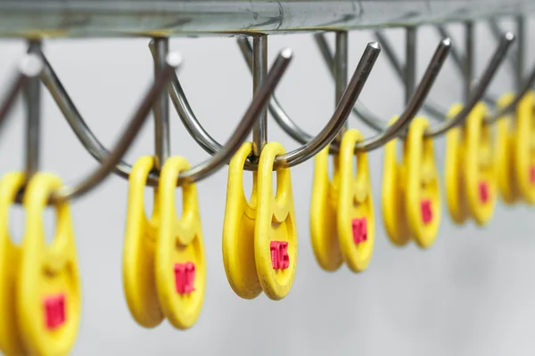 Number written on tag hanging in checkroom. — Stock Photo, Image