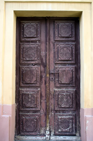 Old iron door with key-stone