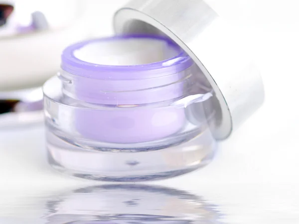 Closeup of jar of moisturizing face cream. Open container of cre — Stock Photo, Image