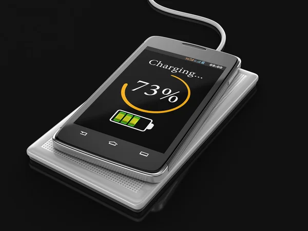 Wireless charging of smartphone (clipping path included) — Stock Photo, Image