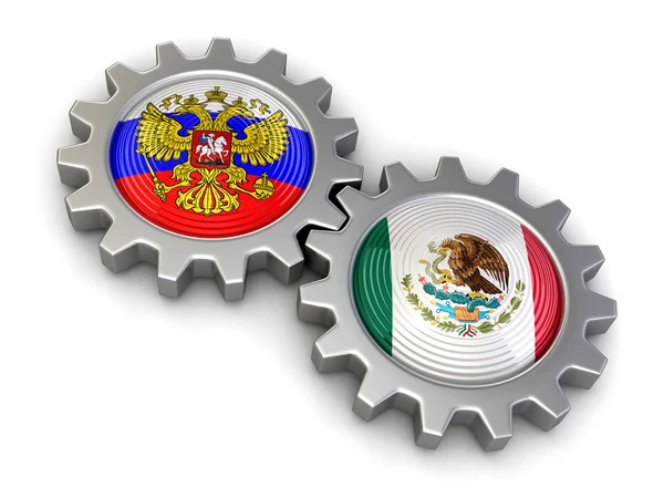Російська та мексиканської прапори на gears (відсічний контур включені) — стокове фото