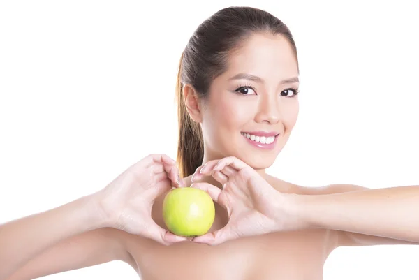 Beautiful young asian woman with flawless skin and perfect make-up, holding apple — Stock Photo, Image