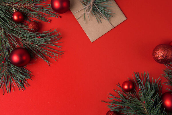 Christmas background on red with festive baubles