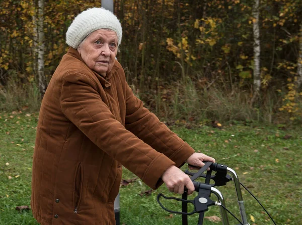 Elderly Woman Taking Walk Autumn Walker Aid Enjoy Fresh Air — Stock Photo, Image