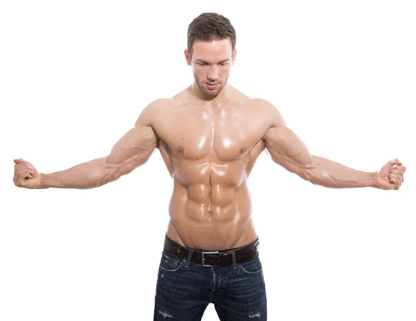 Όμορφος νεαρός bodybuilder με τέλειο και κατάλληλο σώμα επίδειξη μυς του σε απομονωμένες φόντο — Φωτογραφία Αρχείου