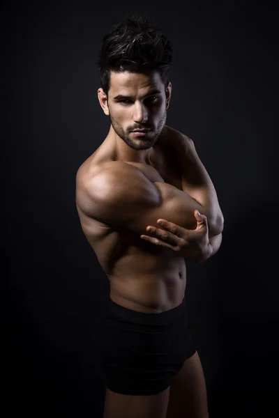 Handsome muscular young bodybuilder — Stock Photo, Image