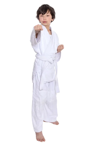 Young asian boy isolated on white in judo clothing doing martial arts — Stock Photo, Image