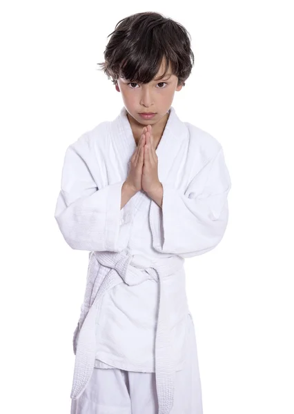 Young asian boy isolated on white in judo clothing doing martial arts — Stock Photo, Image